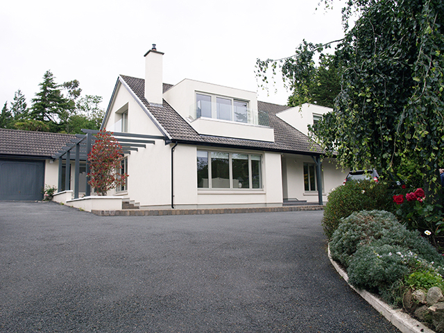 Double dormer with balcony maximising interior light and exterior views