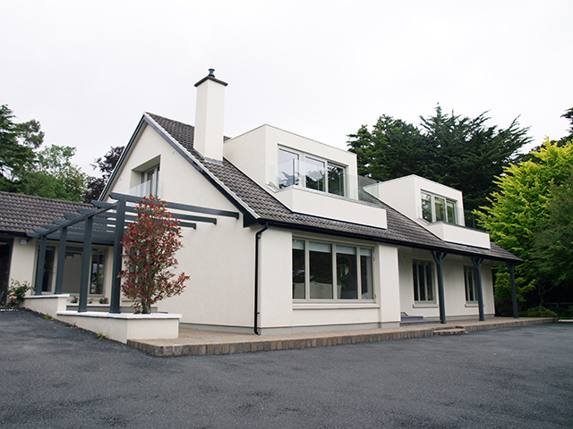 Double dormer with balcony maximising interior light and exterior views