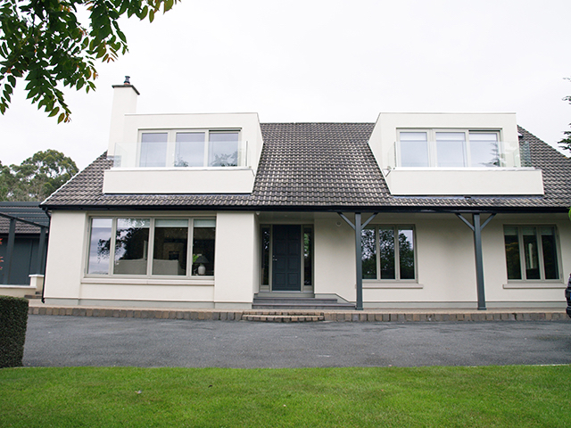 Double dormer with balcony maximising interior light and exterior views