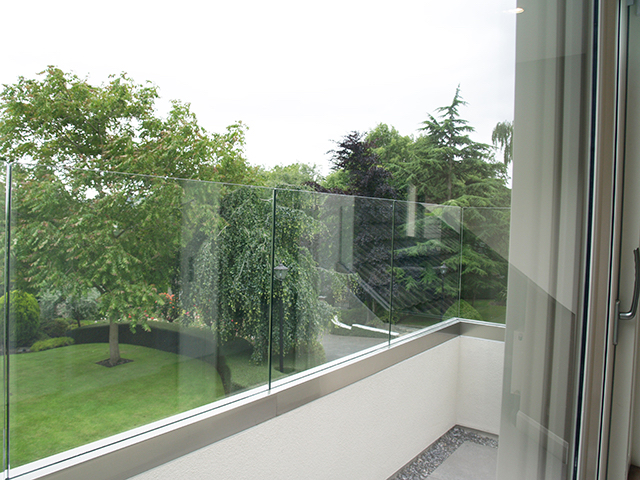 Upstairs balcony overlooking mature garden