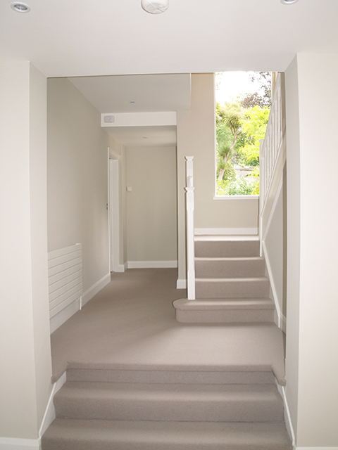 Spacious and bright entrance hall maximising light and view to mature gardens