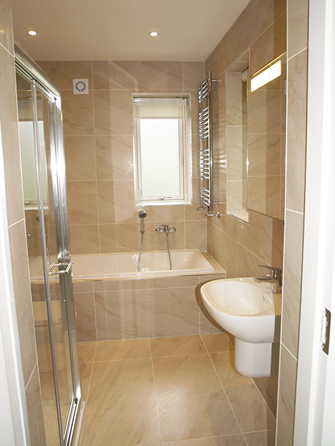 Spacious contemporary downstairs bath and shower room