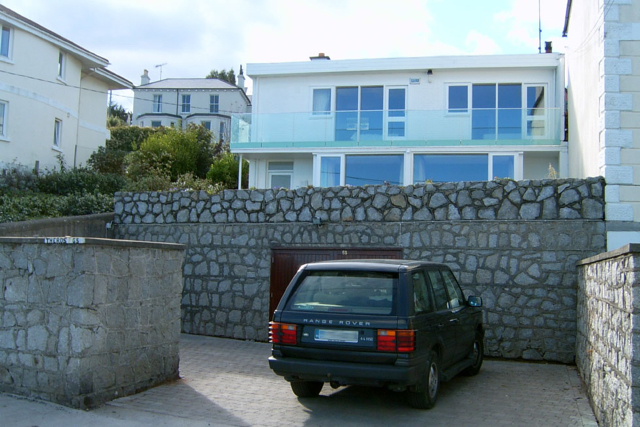 Glass balcony, retaining wall for parking & garage under garden