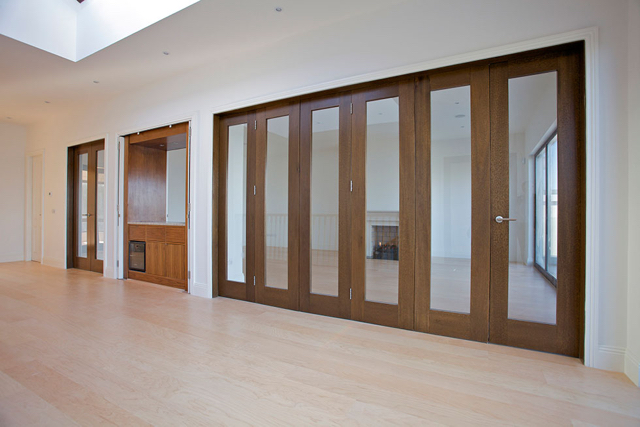 Upper reception hall with folding doors