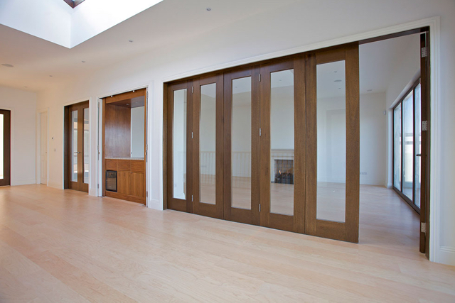 Upper reception hall with folding doors