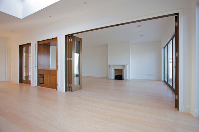 Upper reception hall with folding doors