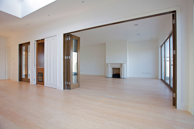 Upper reception hall with folding doors