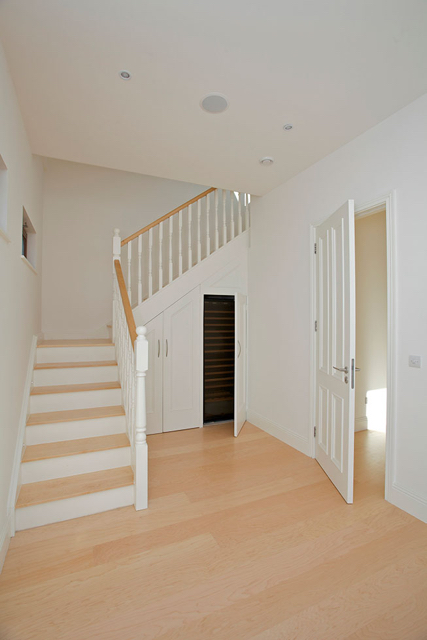 Clever under stairs wine storage area