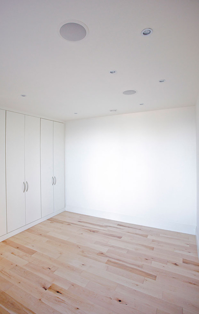 Ample bedroom storage complimented by built in sound system